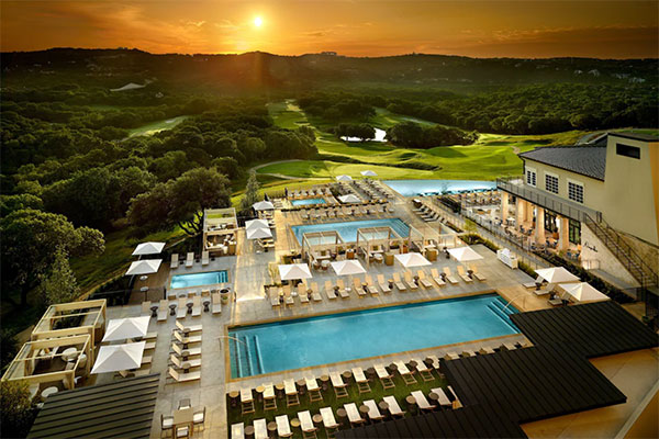 omni barton hotel - view of pools and sunset